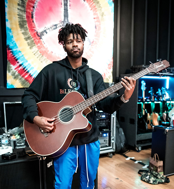 Bernard Harvey playing his guitar